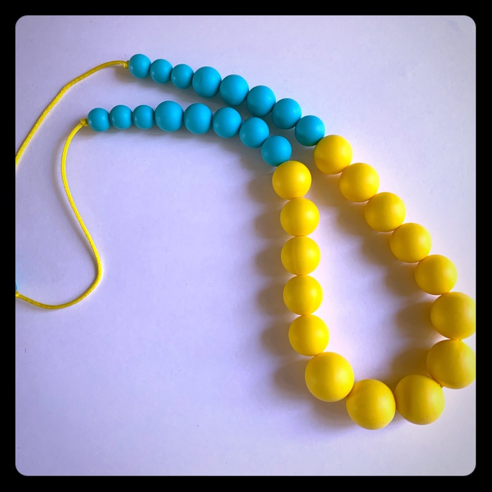 Brand new bead long necklace in yellow/turquoise